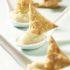 Mini cheese puffs with kohlrabi sauce