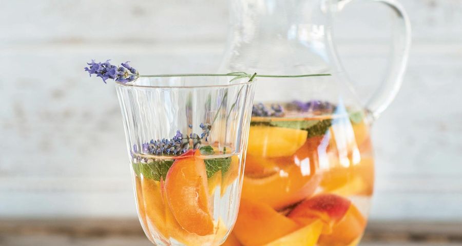 Yellow fruits and lemon balm detox water