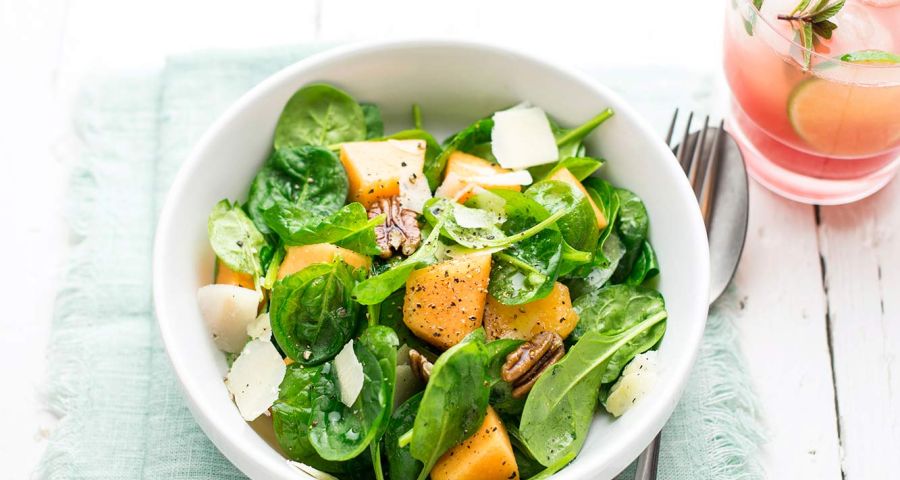 Baby spinach, melon, Parmesan cheese and pecan nut salad