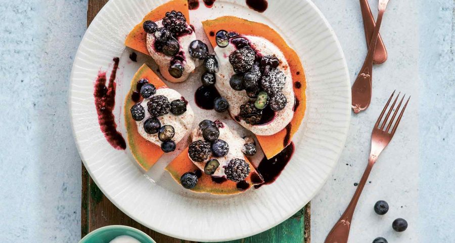 Melon carpaccio with yoghurt and berries