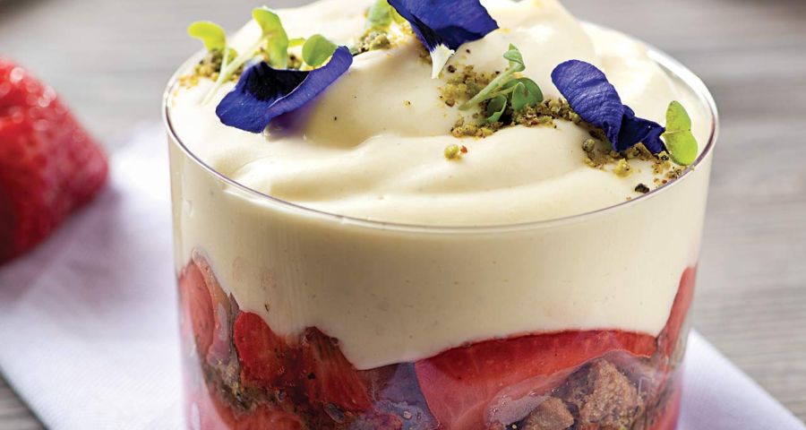 Strawberries and Chantilly cream in small glasses